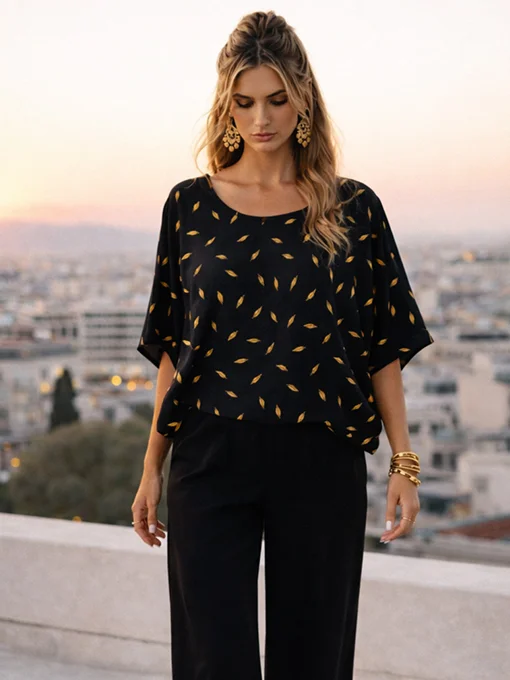 Μπλούζα νυχτερίδα μαύρη φαρδιά με χρυσές λεπτομέρειες