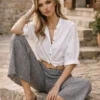 Γκοφρέ καρό παντελόνα μαύρη με ψάθινη ζώνη